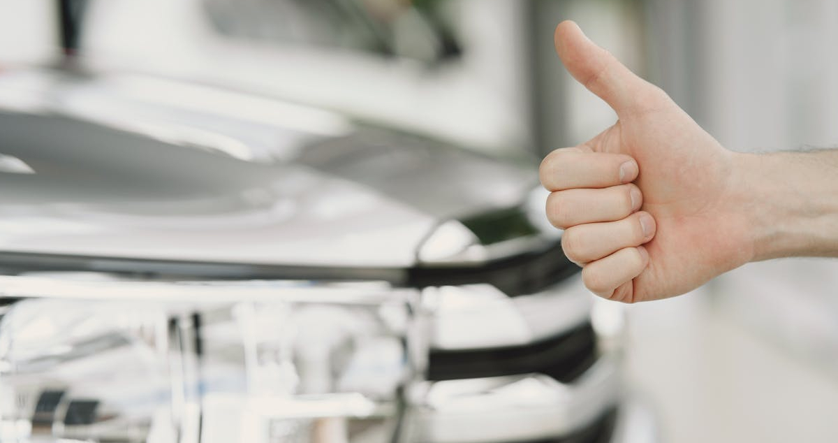Car rental and thumbs up