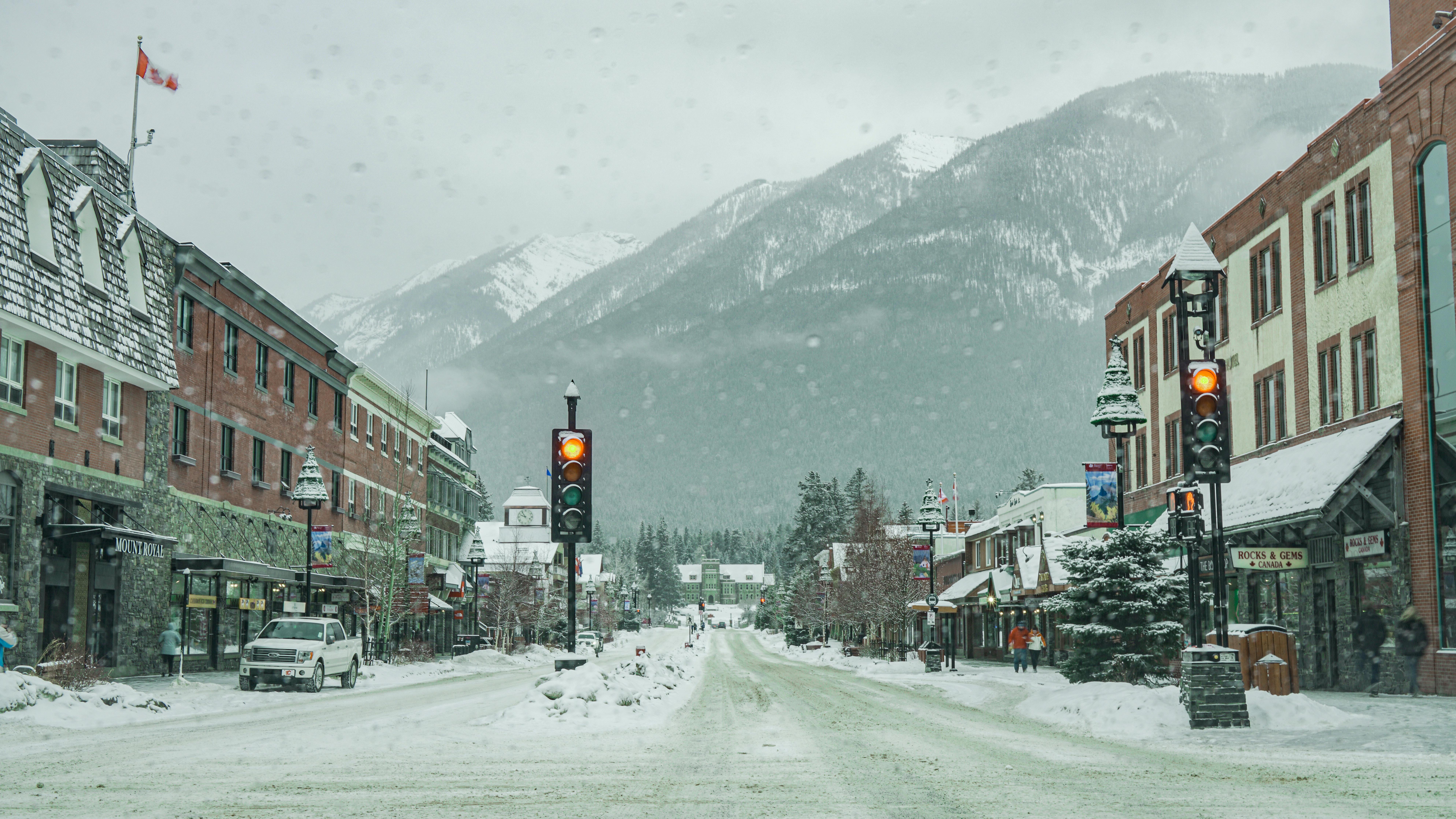 Banff - Town Street and Mountains in Winter
